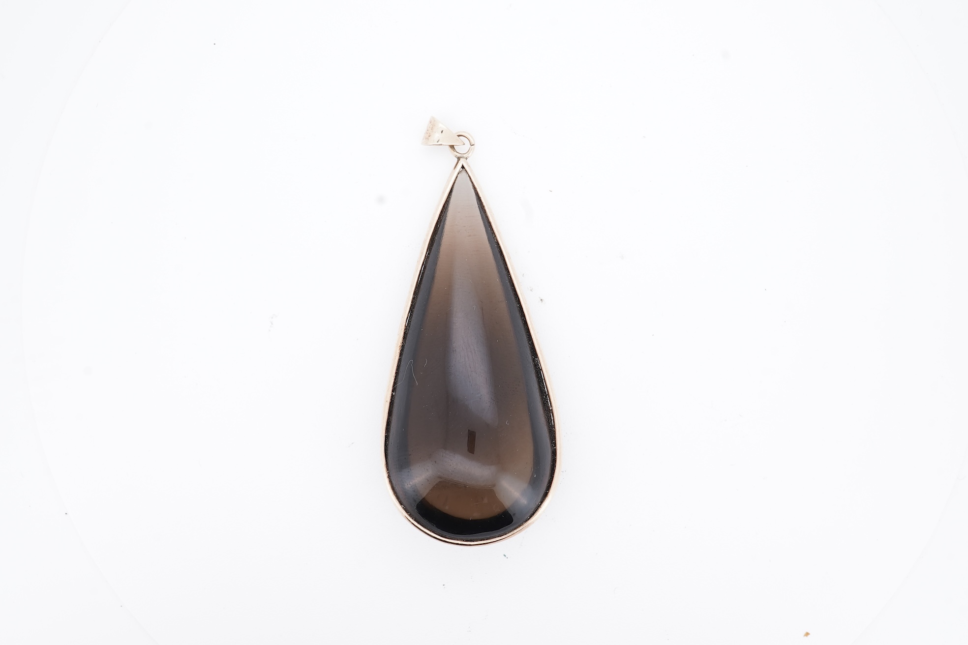 A yellow metal mounted pear shaped smoky quartz set drop pendant, overall 59mm.